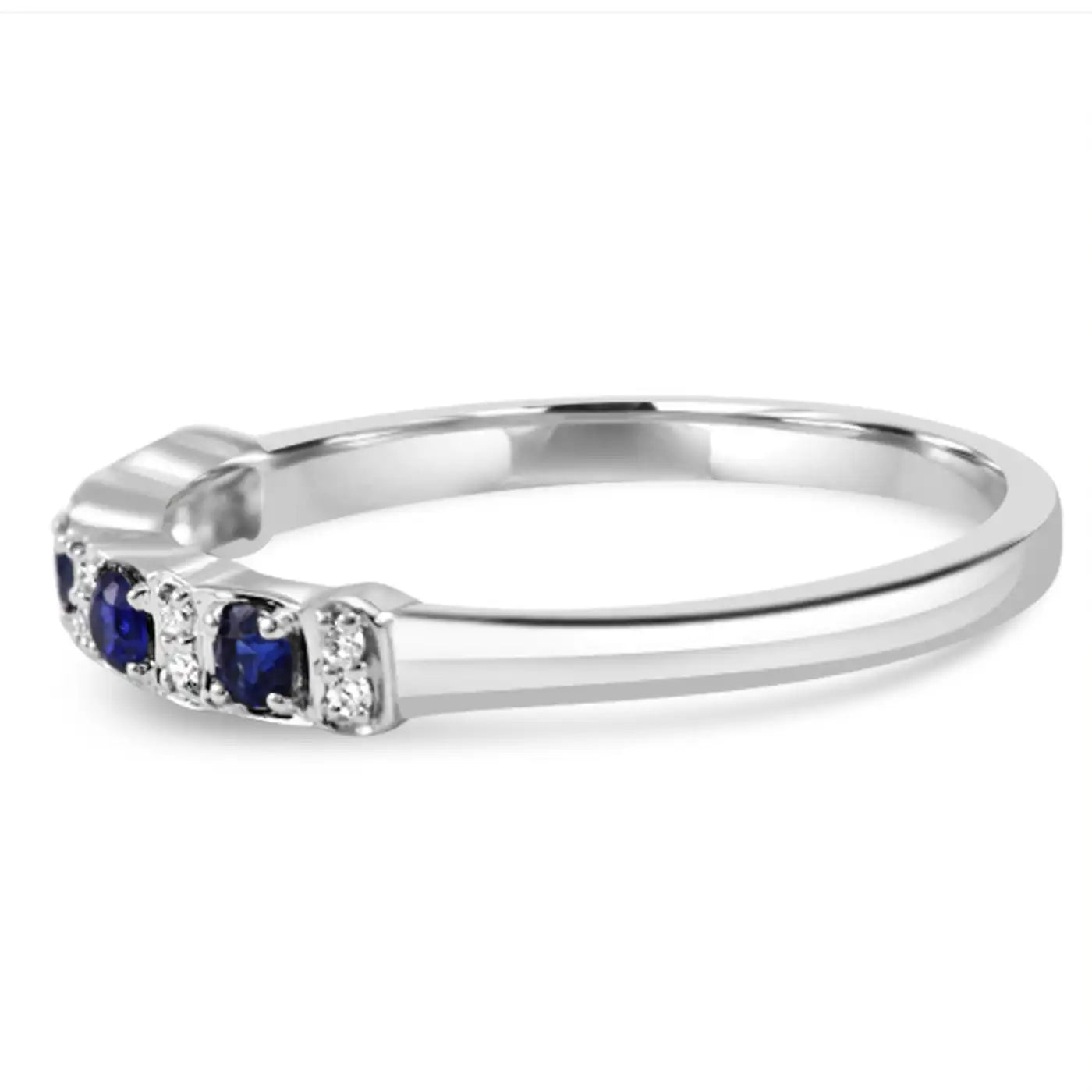 Anillo de compromiso de oro de 18 quilates con zafiro azul y diamantes blancos redondos