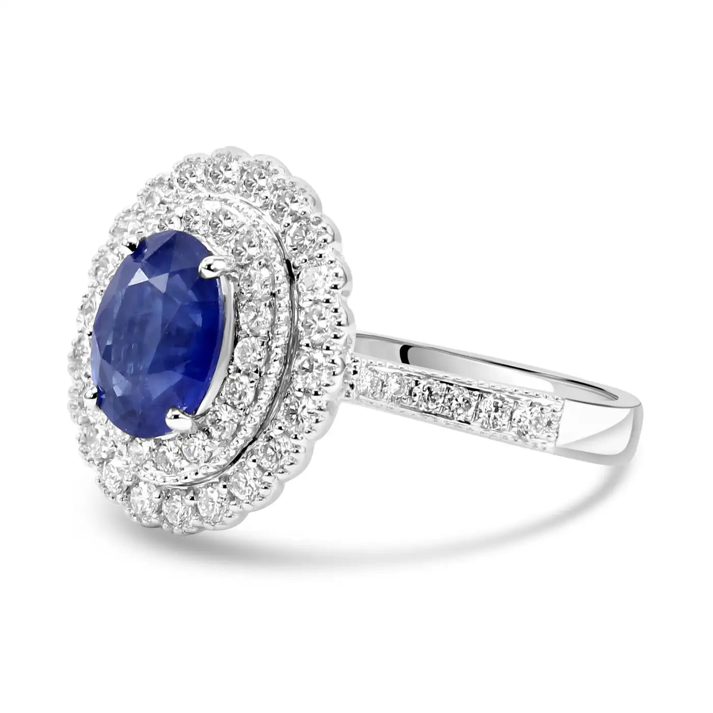 Anillo de compromiso de oro de 18 quilates con halo doble de diamantes blancos y zafiro de Ceilán