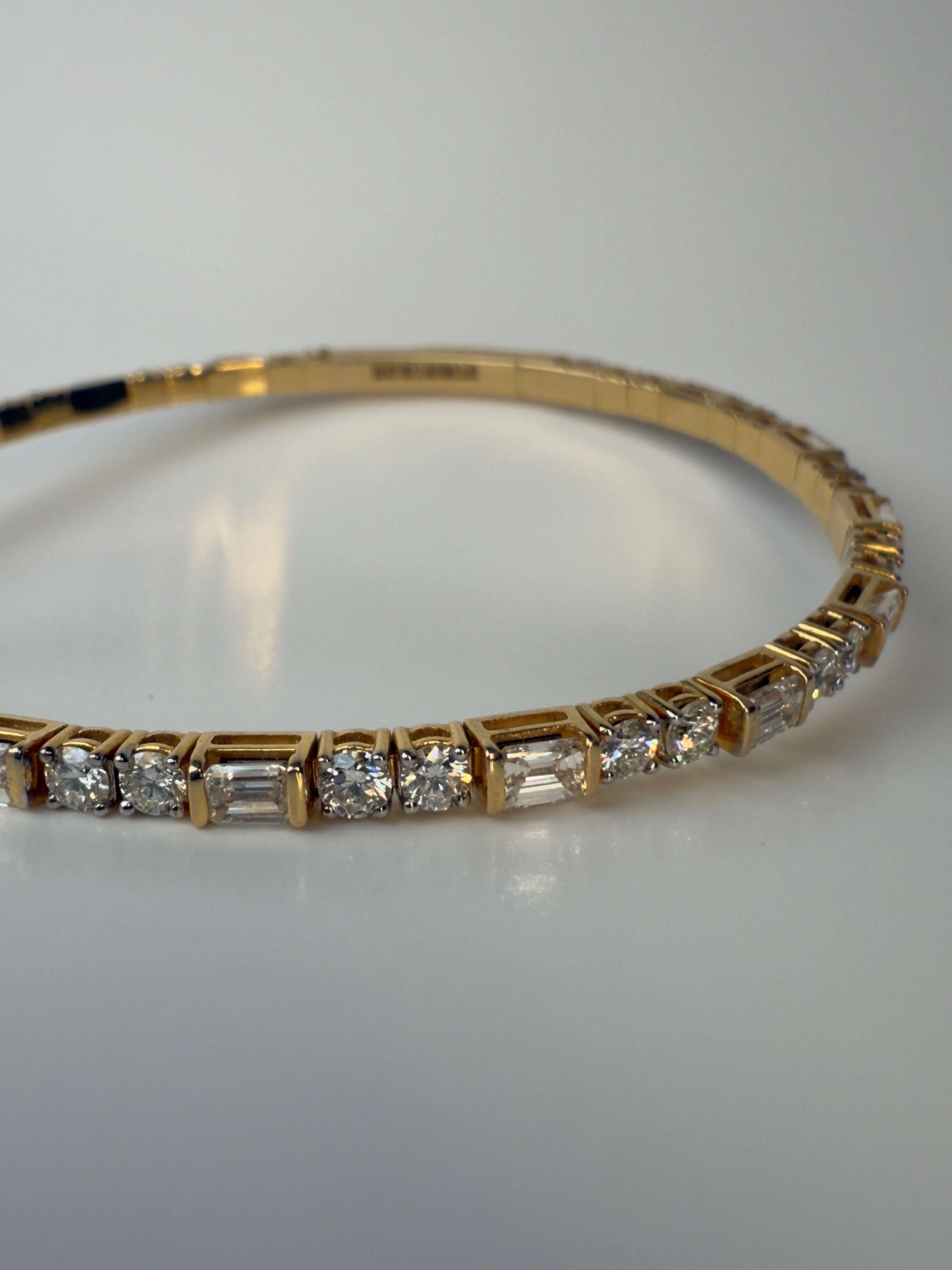18KT Yellow Gold Diamond Bangle with Round & Emerald-Cut Diamonds – 5.02 CTW