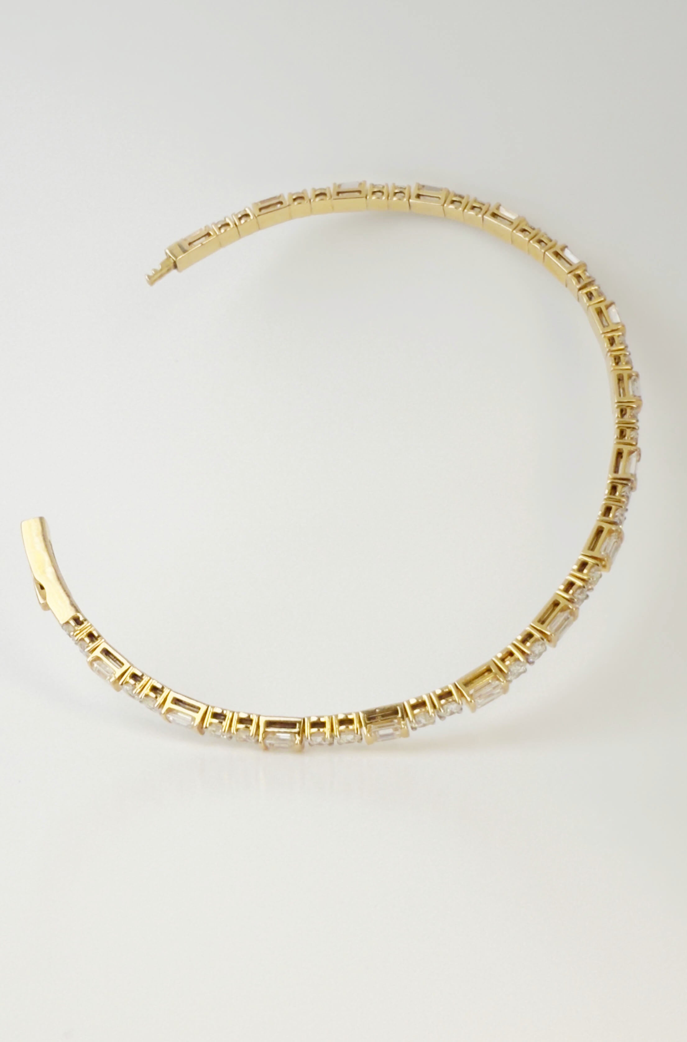 18KT Yellow Gold Diamond Bangle with Round & Emerald-Cut Diamonds – 5.02 CTW