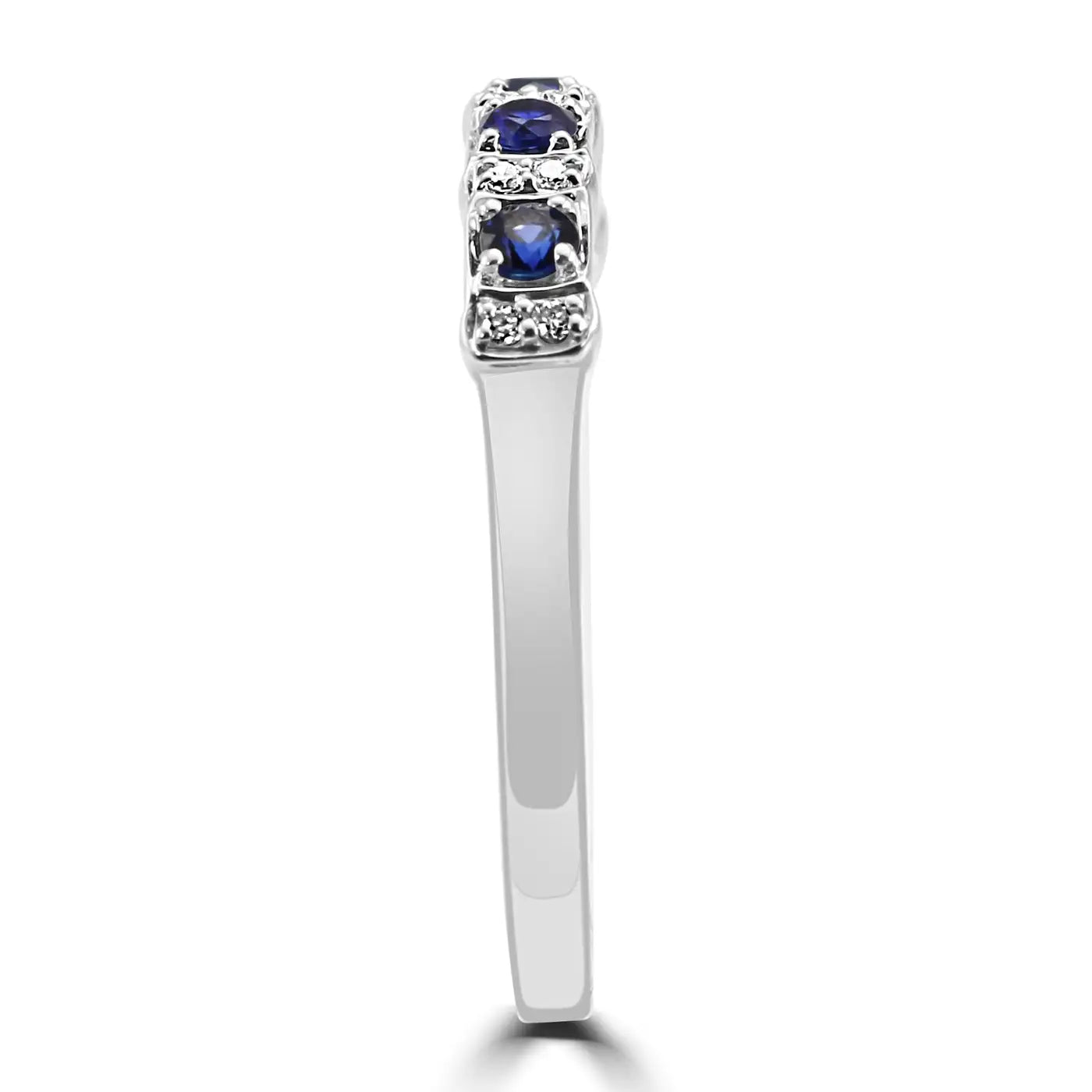 Anillo de compromiso de oro de 18 quilates con zafiro azul y diamantes blancos redondos