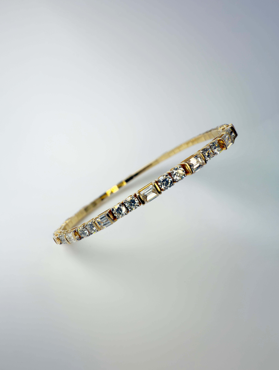 18KT Yellow Gold Diamond Bangle with Round & Emerald-Cut Diamonds – 5.02 CTW