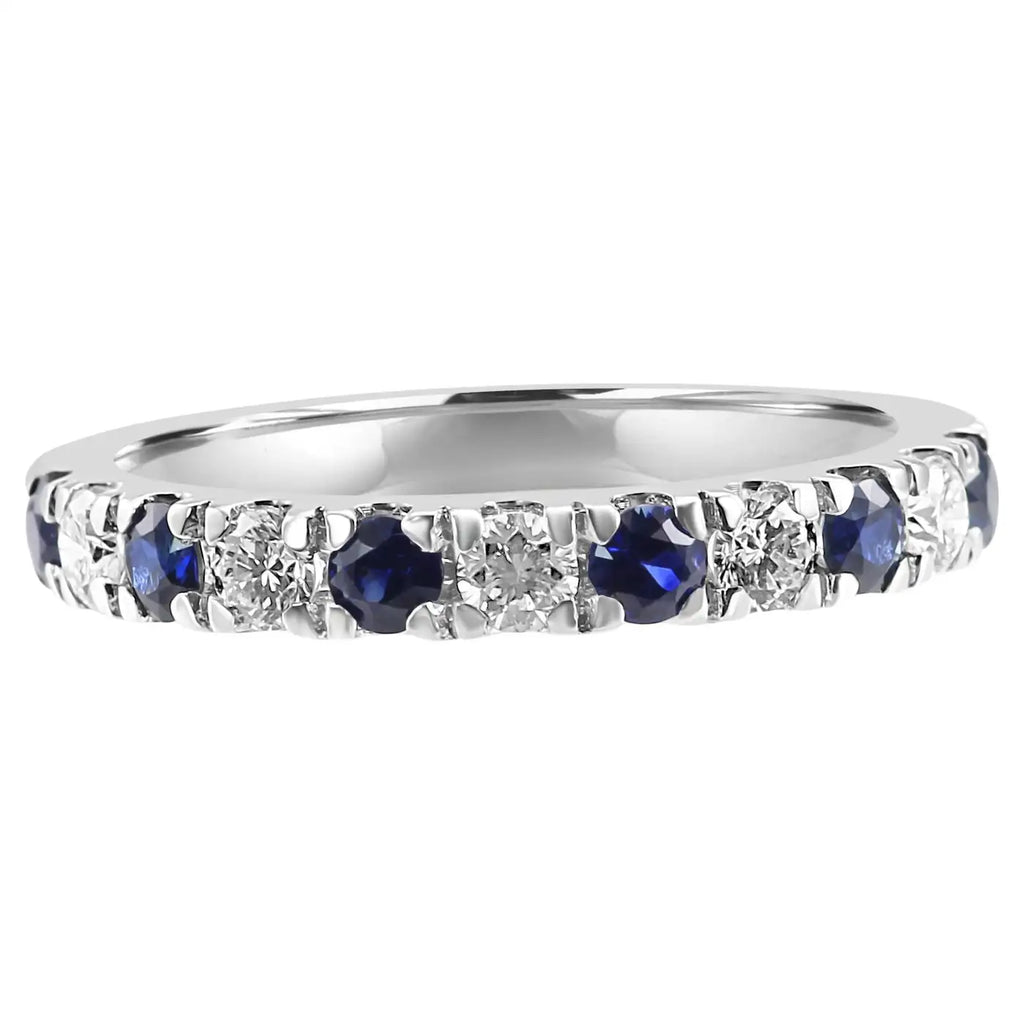 Anillo de compromiso de oro de 18 quilates con diamantes blancos y zafiro azul